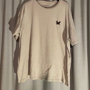 Tan PacSun tee with butterfly stitching
